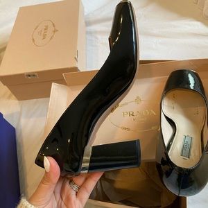 Prada black patent pumps
